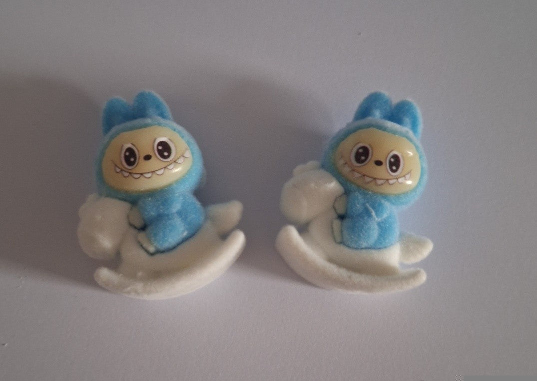 Blue labubu on white rocking horse felt feel beads